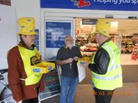 Lions collecting at Tesco Honiton for Marie Curie