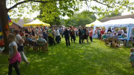 Crowds at the fete by Lions plate smashing stand