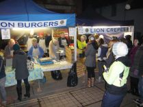 Full steam ahead at the BBQ stand as the crowds line up to purchase their burgers etc.