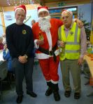 Lions Tom and Ron with Lion Santa Bob