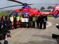 BBC Radio Devon presenter Judi Spiers with cheque for DAAT