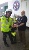Lion President Brian with Dan from Freewheelers and DeFib