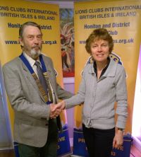 Lion President John with grant of £160 to Ruth Bizley