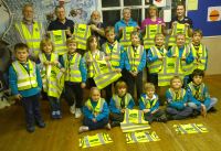 Scouts with their Hi-Vis jackets with Lion President Brian